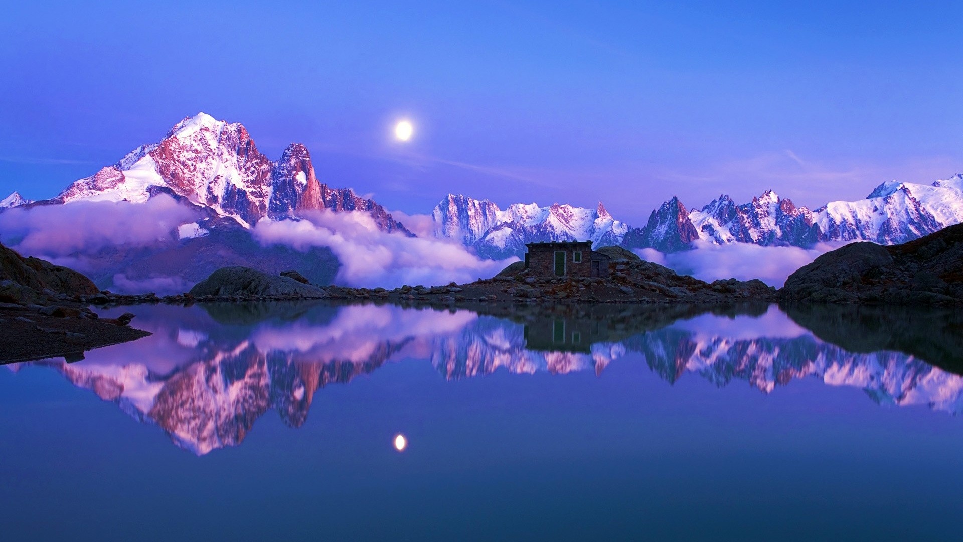 Moonlit Mountains Reflected in a Lake with a Cabin HD Wallpaper