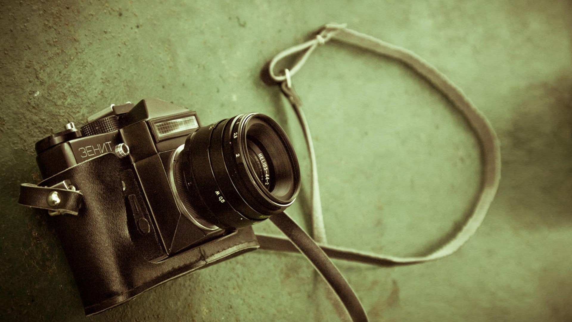 Zenit camera with Helios lens and leather holster HD Wallpaper