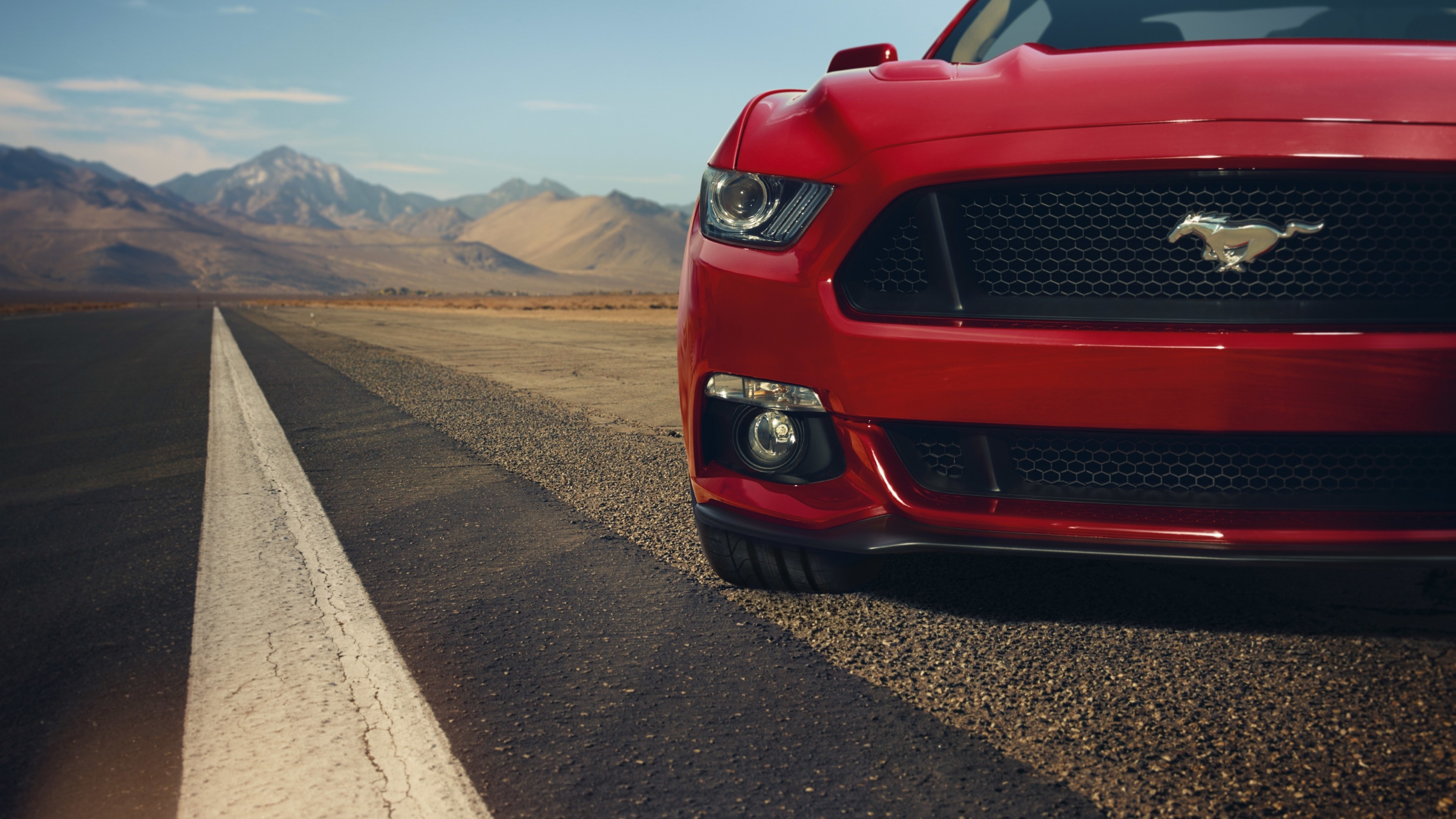 2015 Ford Mustang on a desert road HD Wallpaper