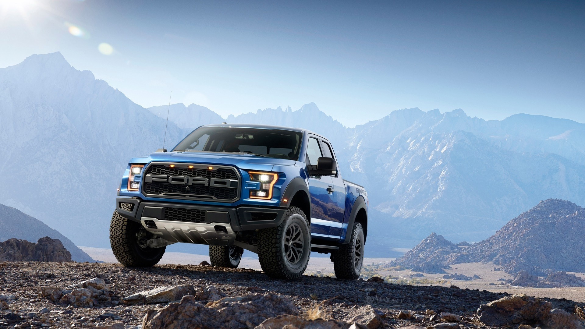 Blue Ford F-150 Raptor in Mountains HD Wallpaper
