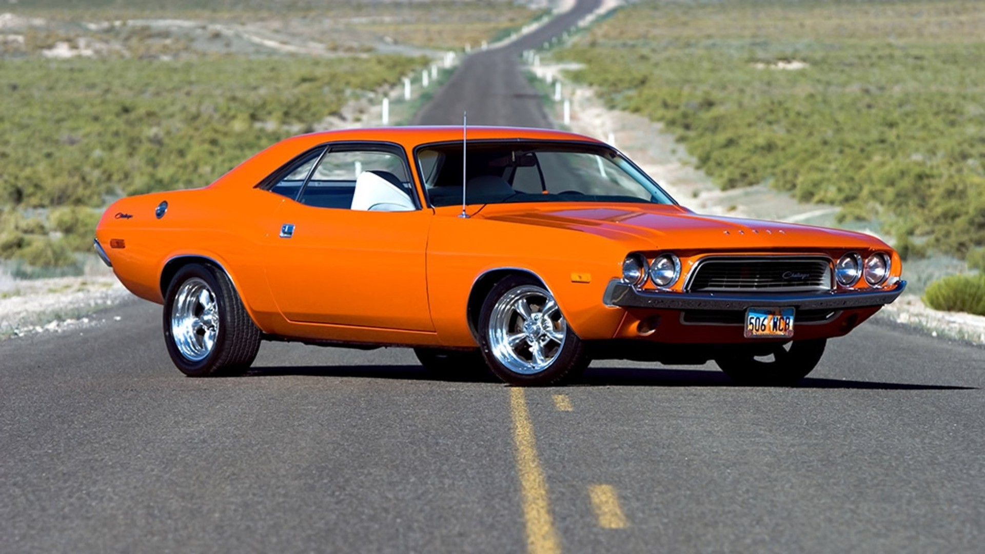 Orange Dodge Challenger on a Desert Road HD Wallpaper