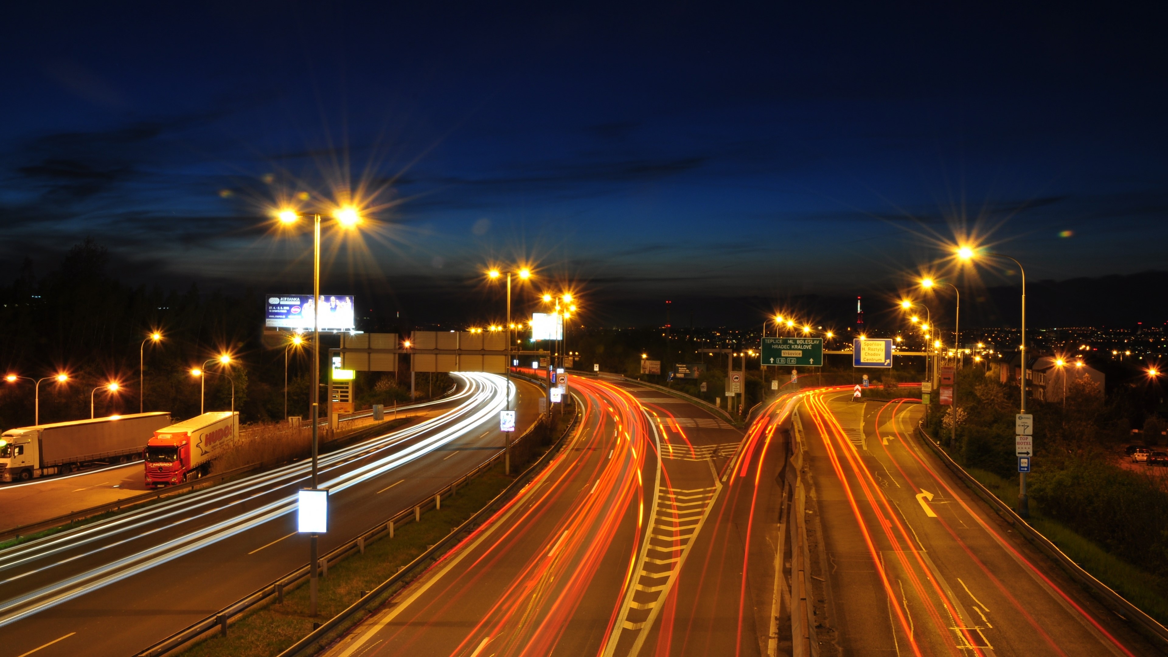 4K Night highway with light trails HD Wallpaper