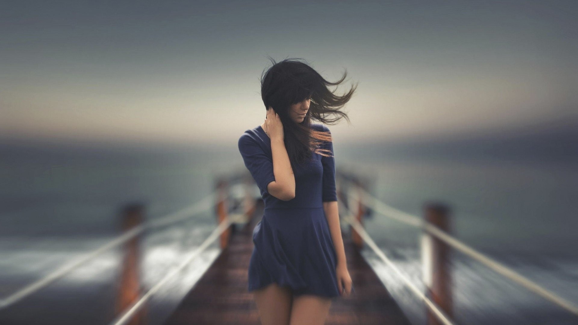 Woman in blue dress on a pier HD Wallpaper