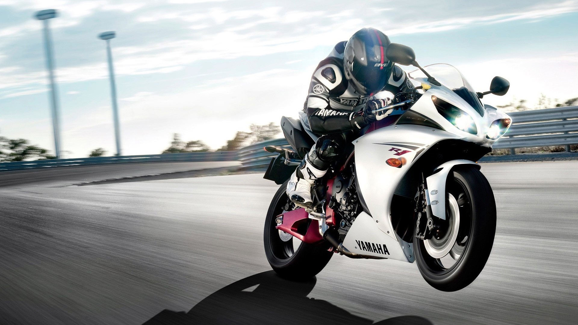 Yamaha R1 sport bike racing on a track HD Wallpaper