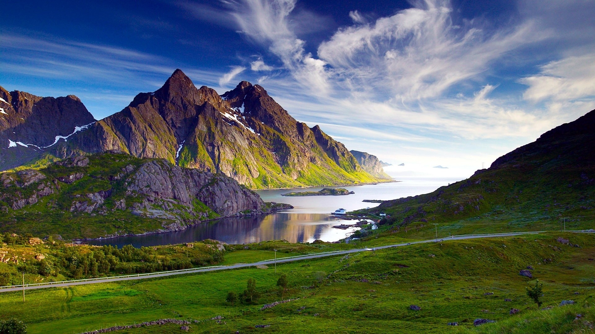 Mountain landscape with a bay and a road HD Wallpaper