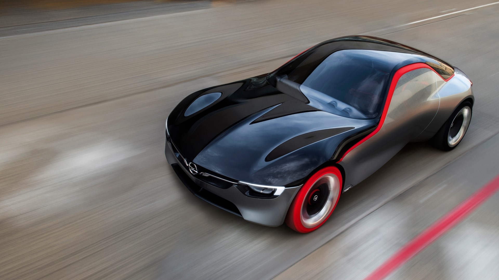Opel GT concept car driving on a road HD Wallpaper