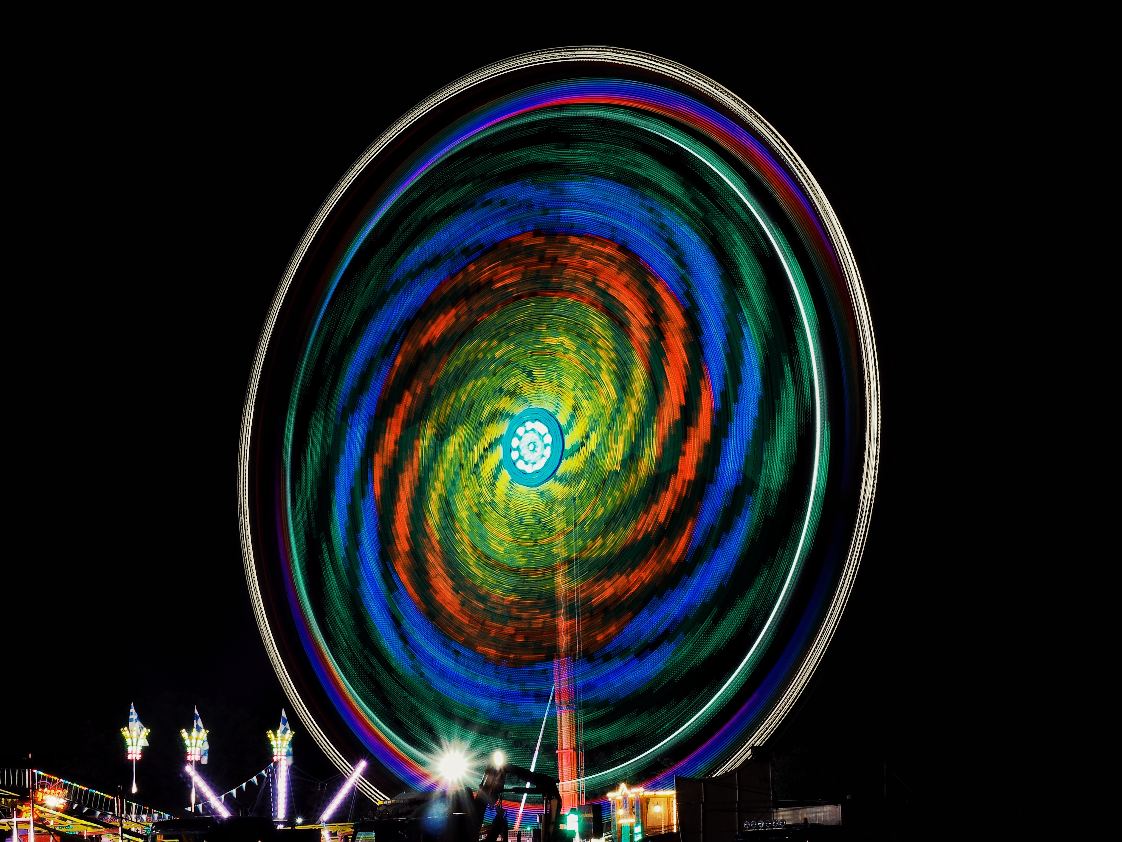 Ferris wheel at night with colorful lights HD Wallpaper