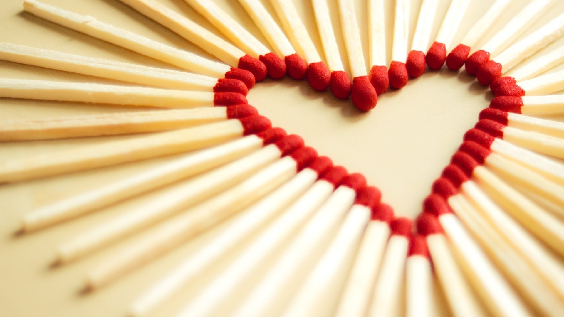 Heart shape made of matches HD Wallpaper