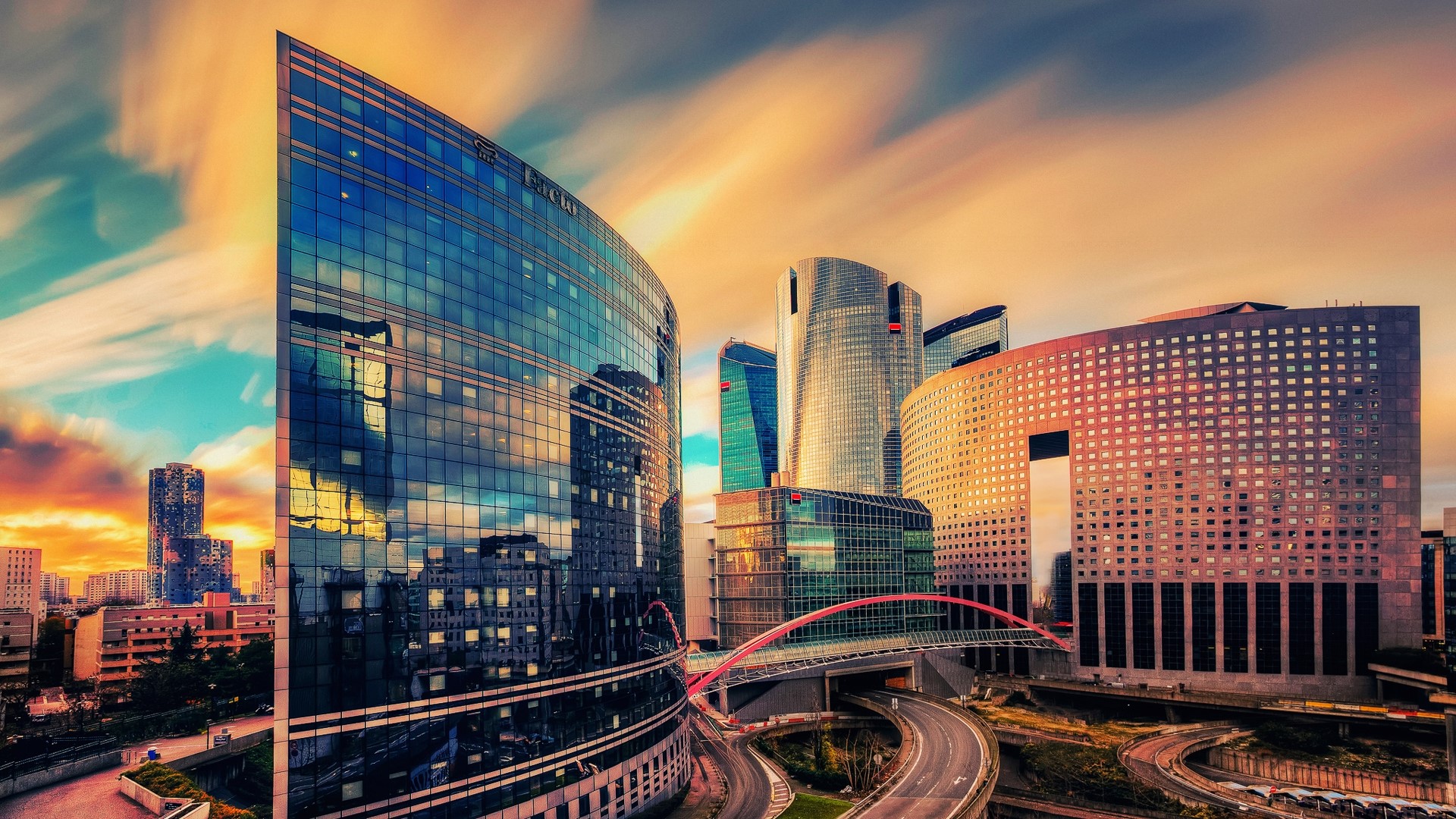 Modern skyscrapers in La Defense, Paris, France at sunset HD Wallpaper