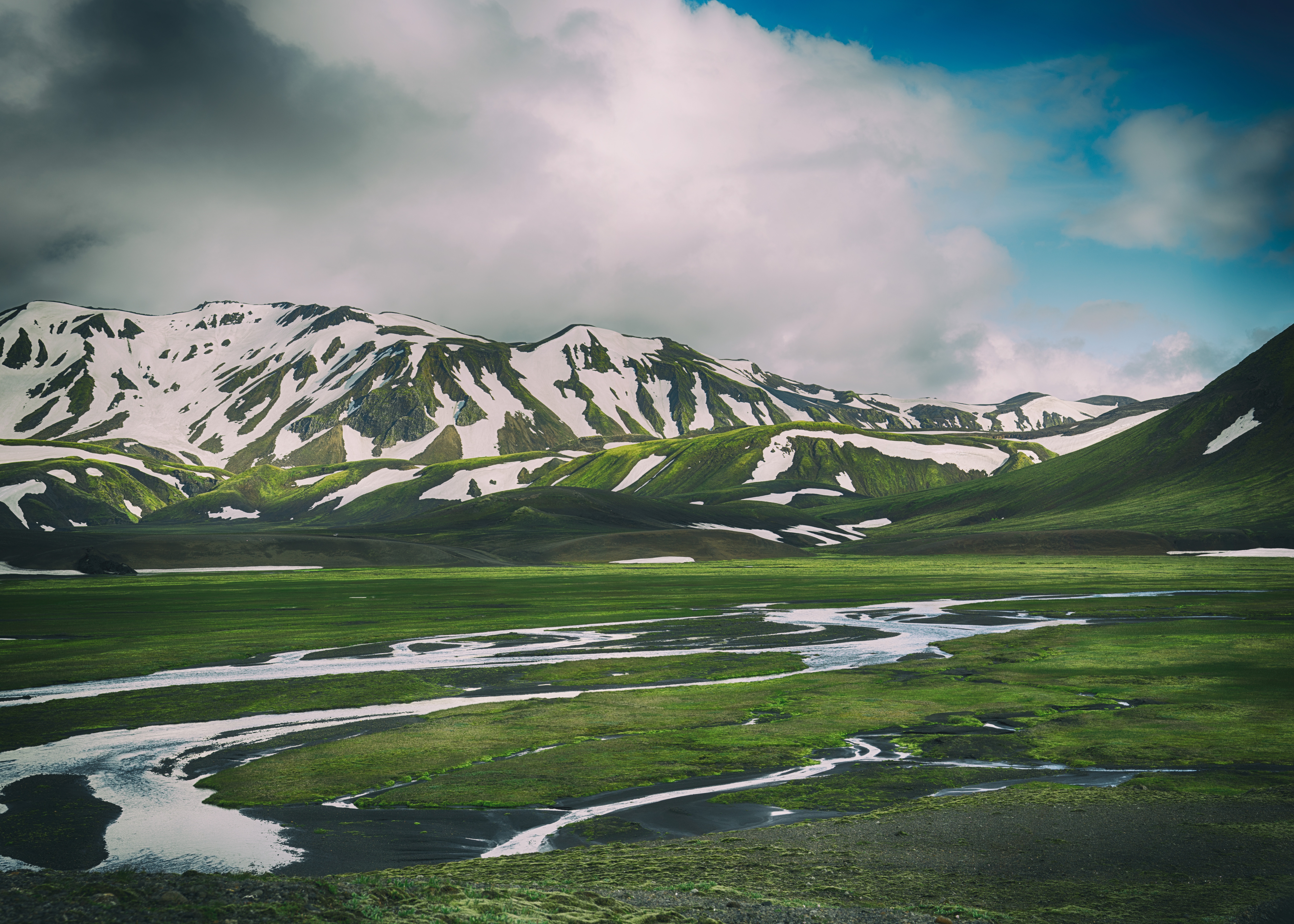 Snow-capped mountains and river in Iceland HD Wallpaper
