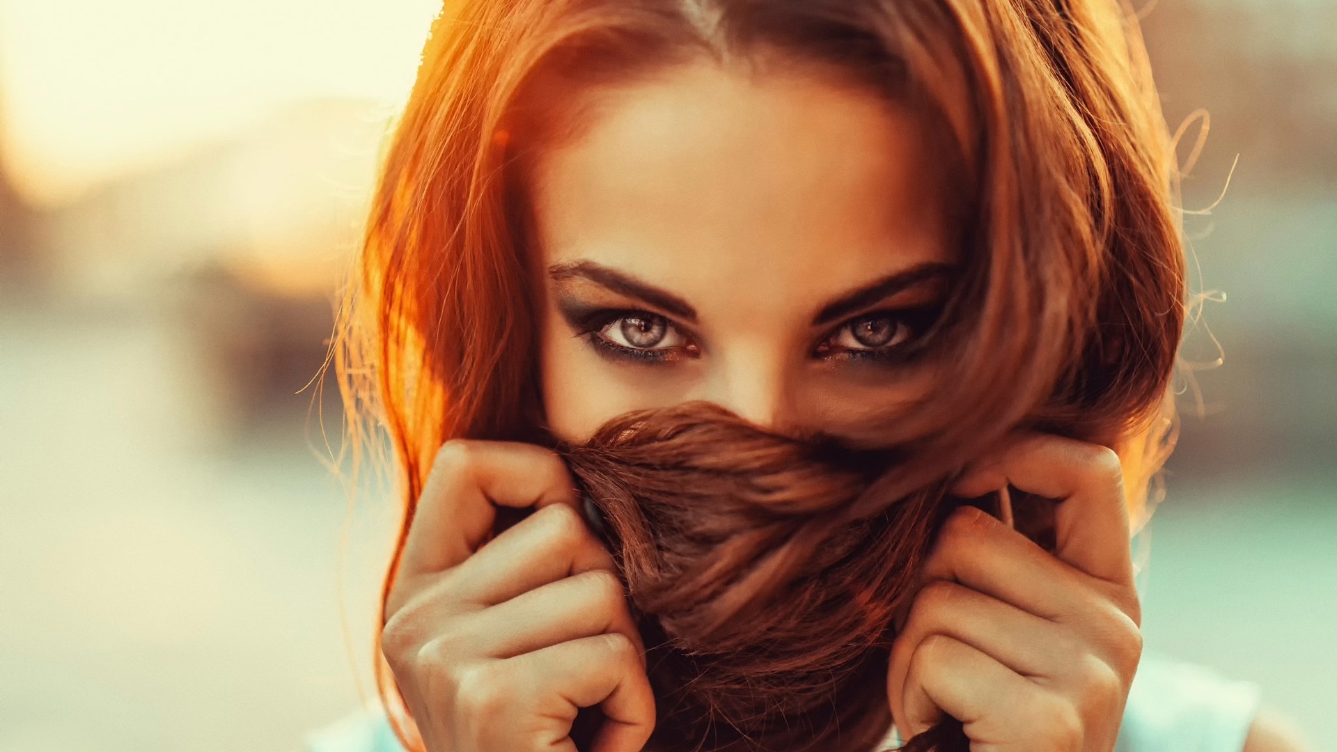 Redhead woman with beautiful eyes hiding face with hair HD Wallpaper