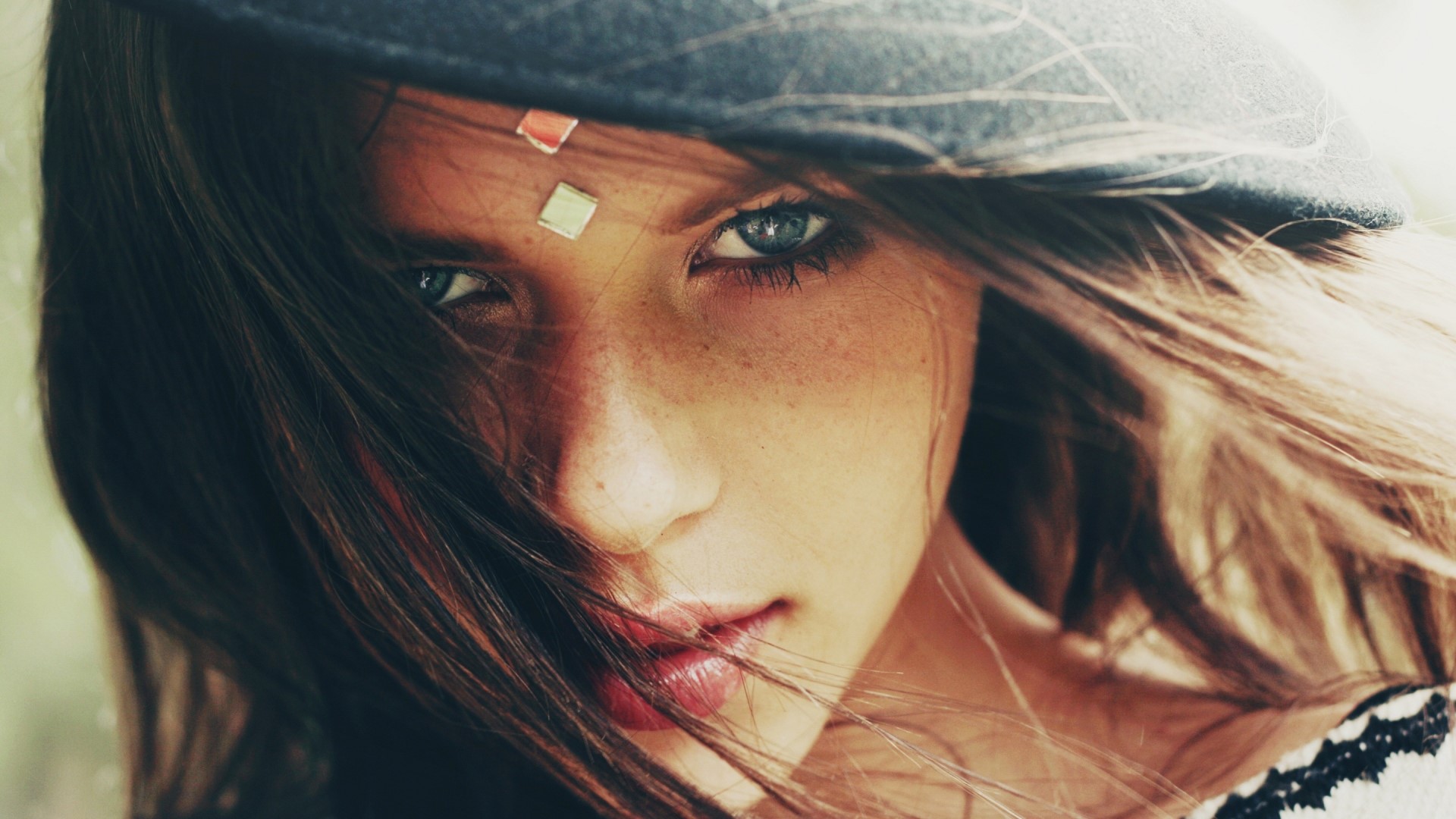 Portrait of Nirrimi Hakanson with face gems HD Wallpaper