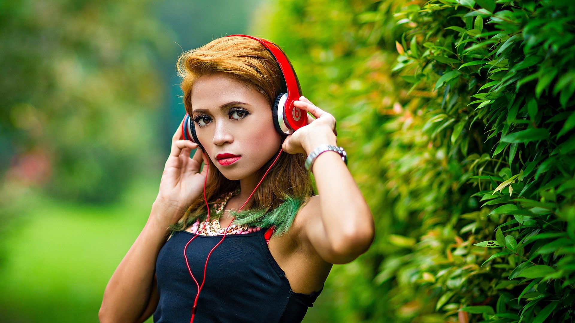 Girl with red Beats headphones in a garden HD Wallpaper