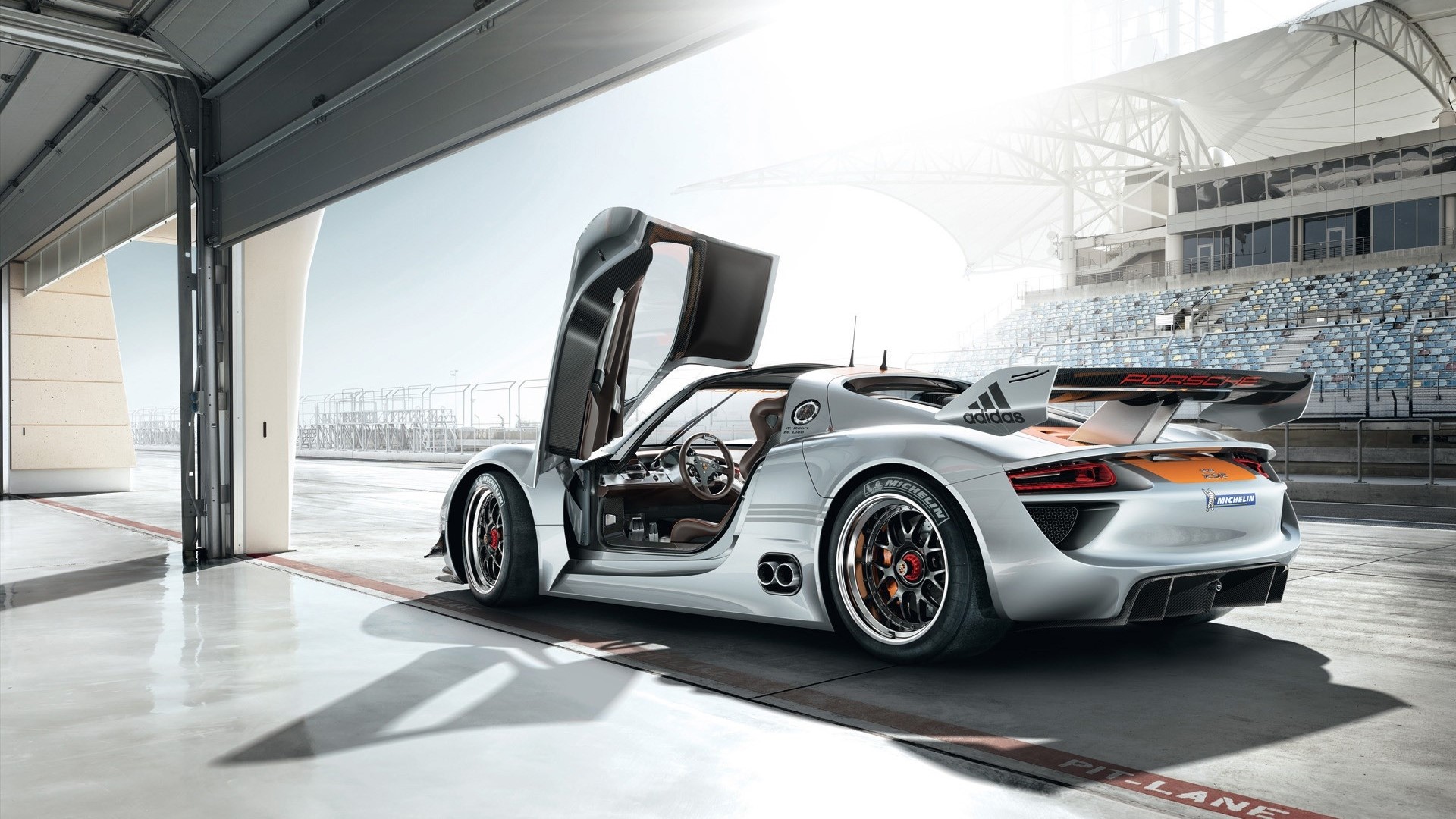 Porsche 918 Spyder on a race track HD Wallpaper