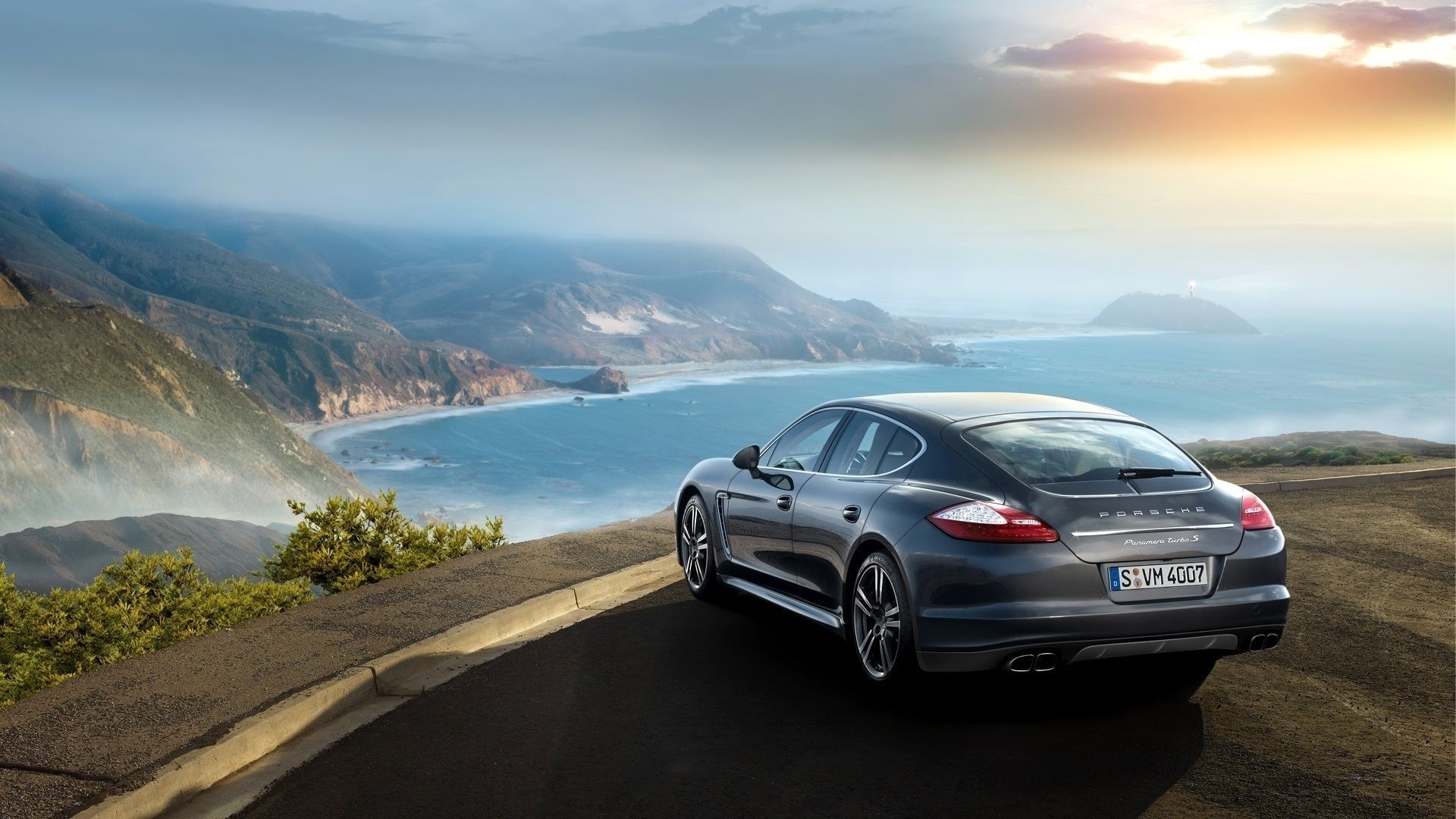 Porsche Panamera Turbo S on a coastal road HD Wallpaper