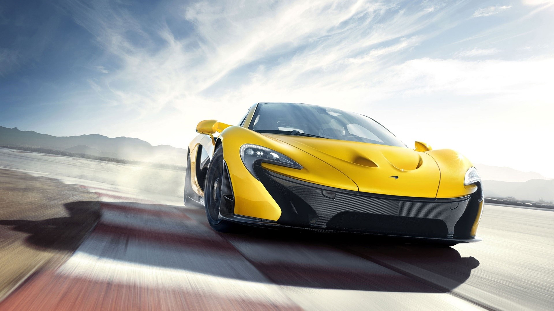 Yellow McLaren P1 on a Racetrack HD Wallpaper