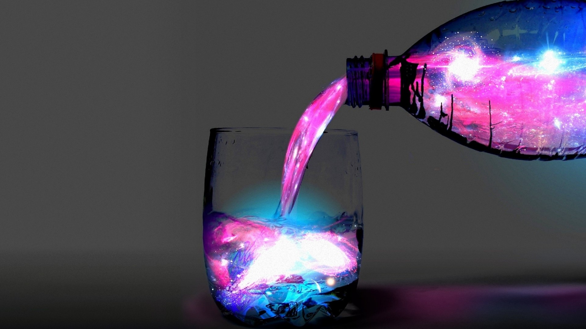 Galaxy liquid being poured from bottle into glass HD Wallpaper