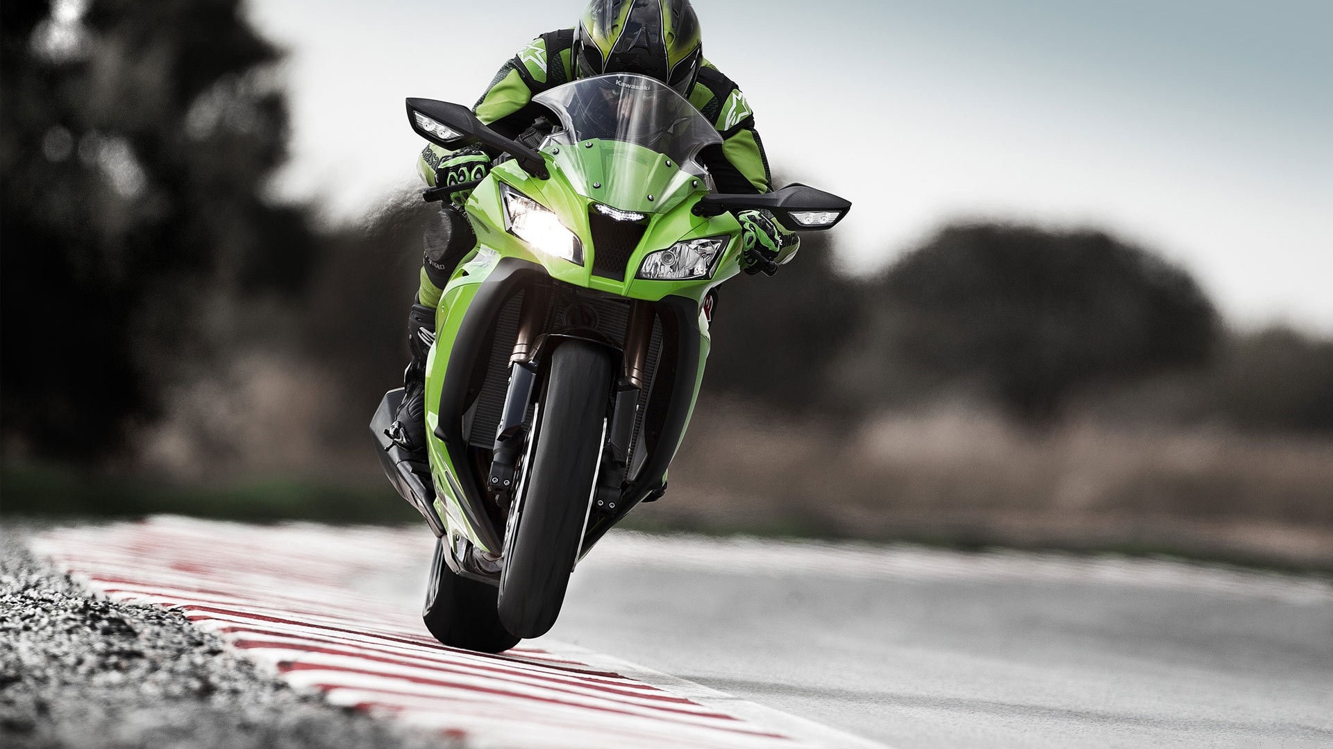 Green Kawasaki Racing Motorbike on Track HD Wallpaper