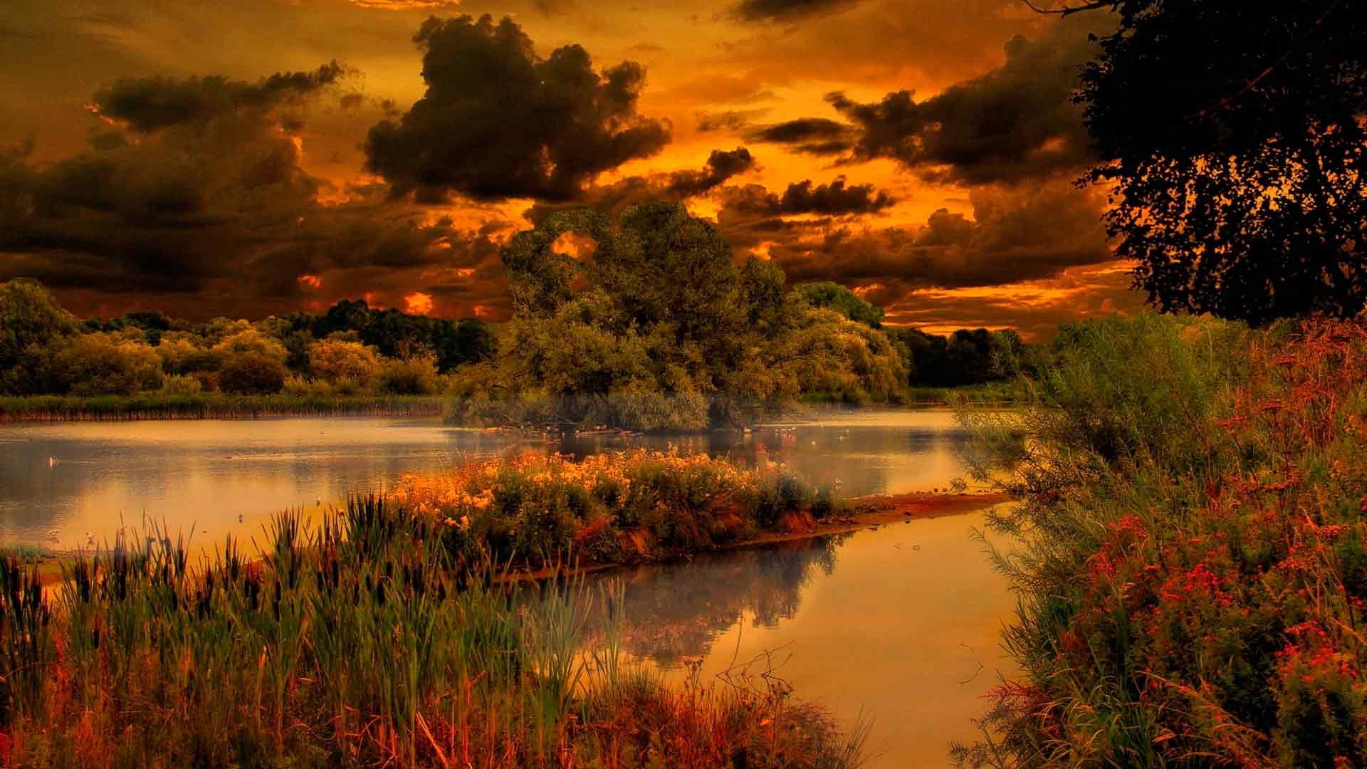 Nature at sunset with dramatic clouds HD Wallpaper
