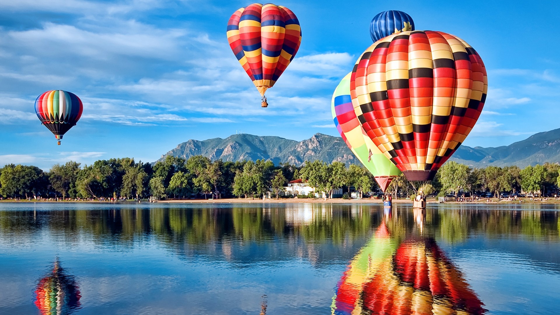 Hot Air Balloons Over Lake and Mountains HD Wallpaper