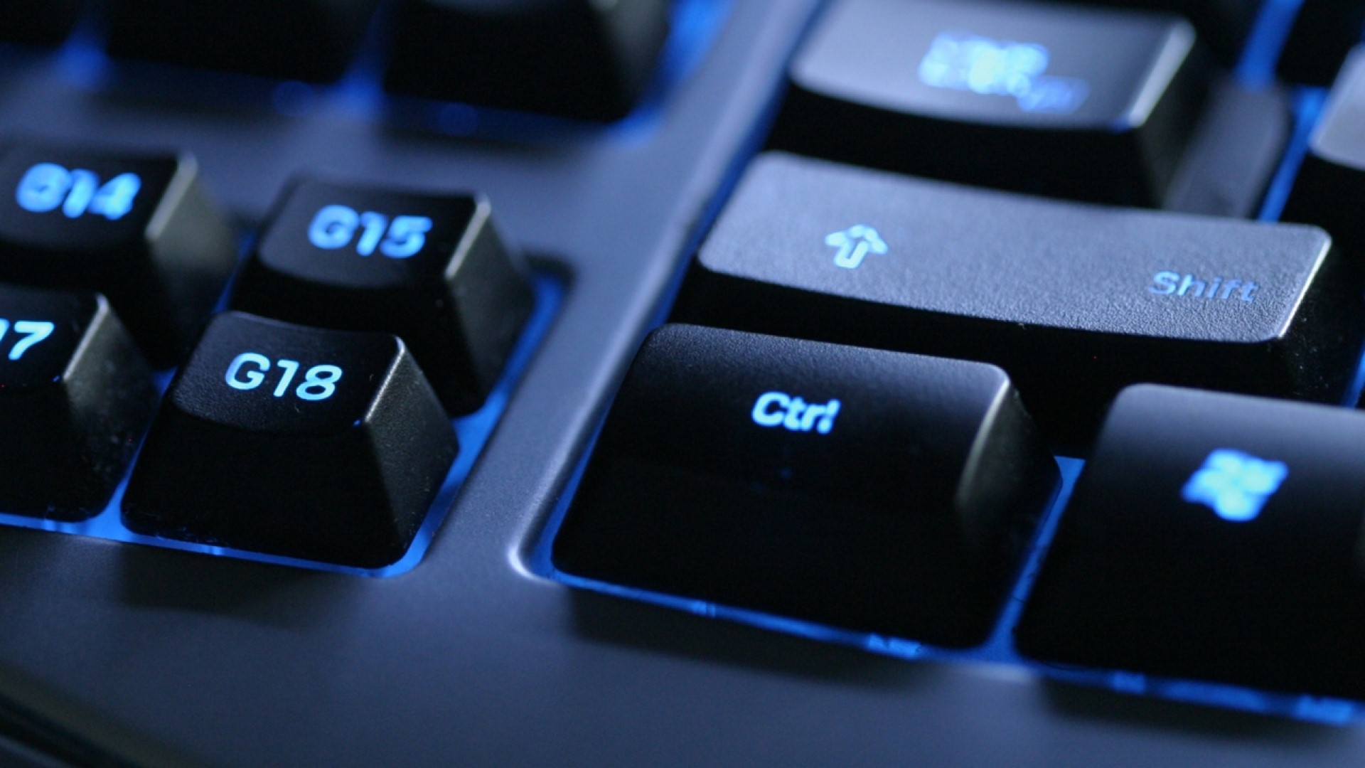 Close-up of a backlit gaming keyboard HD Wallpaper