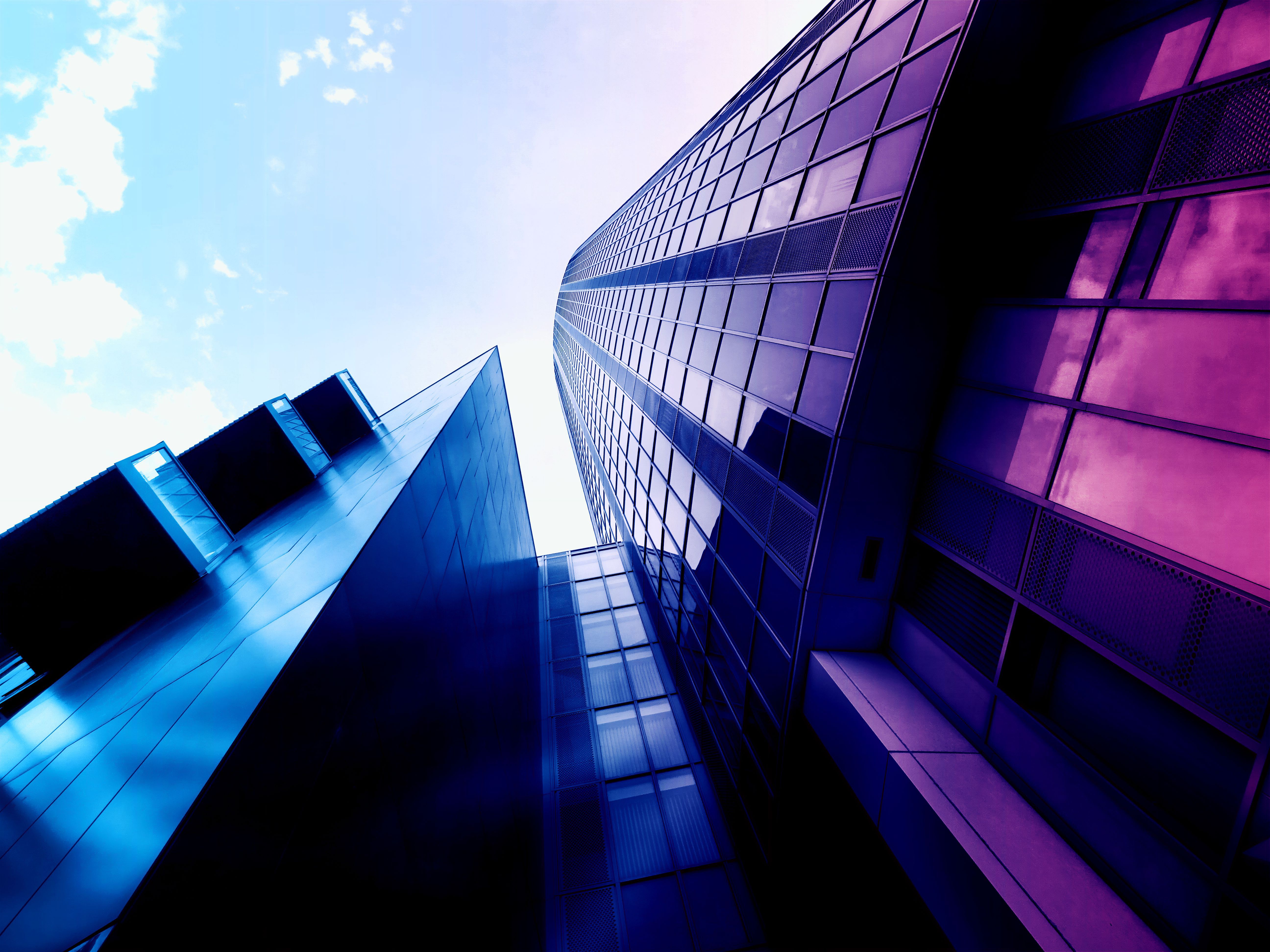 Modern skyscrapers against a blue sky HD Wallpaper