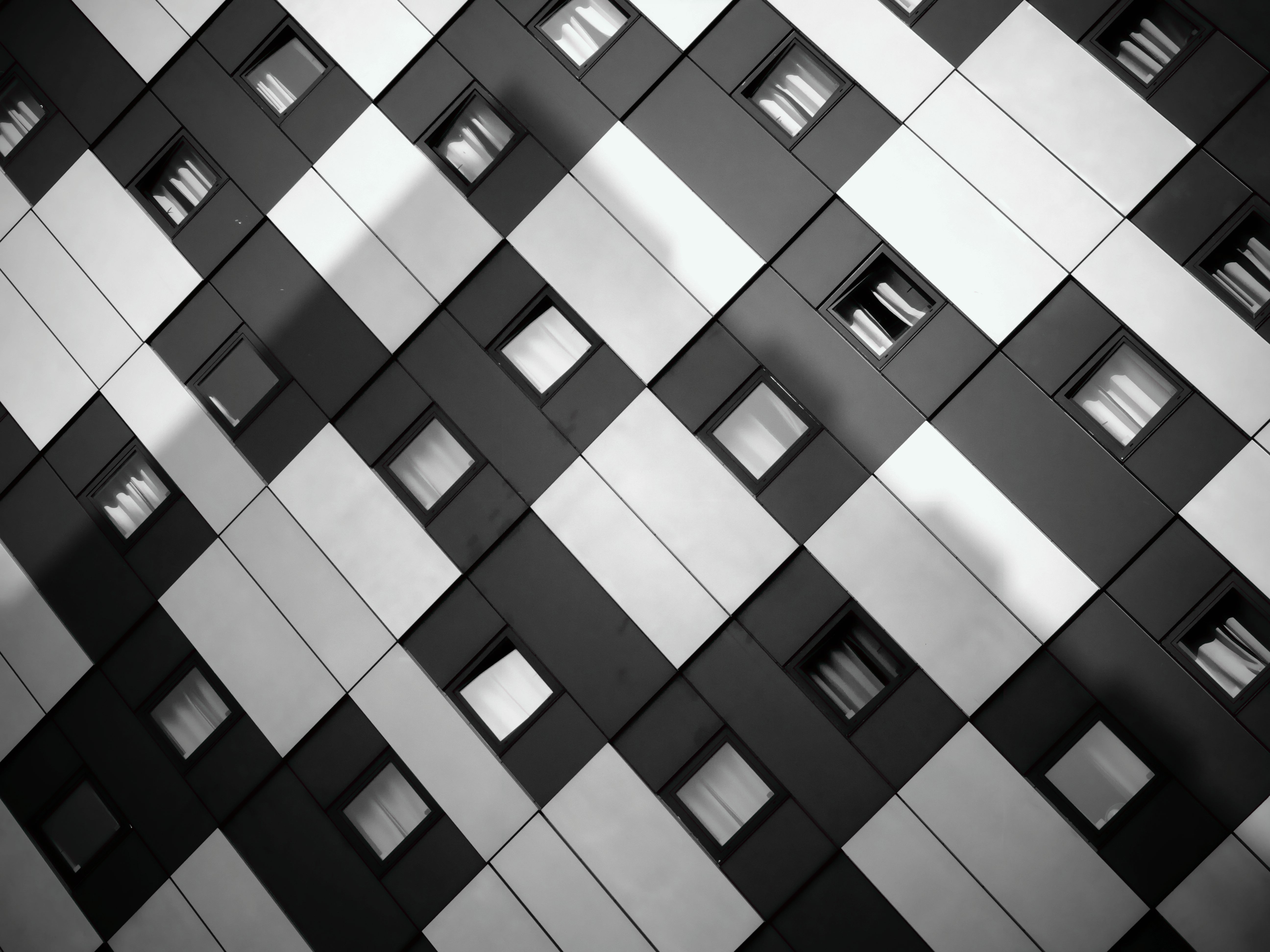 Modern Architecture with Geometric Windows 5K HD Wallpaper