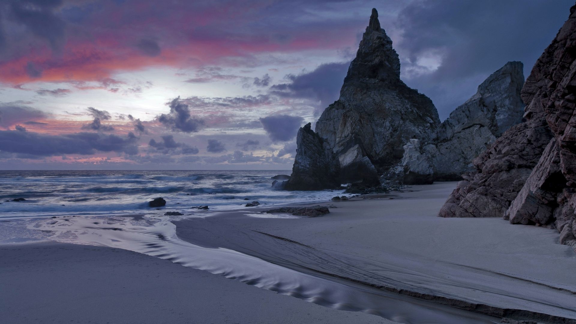 Dramatic Sunset Over Rocky Beach in Portugal HD Wallpaper
