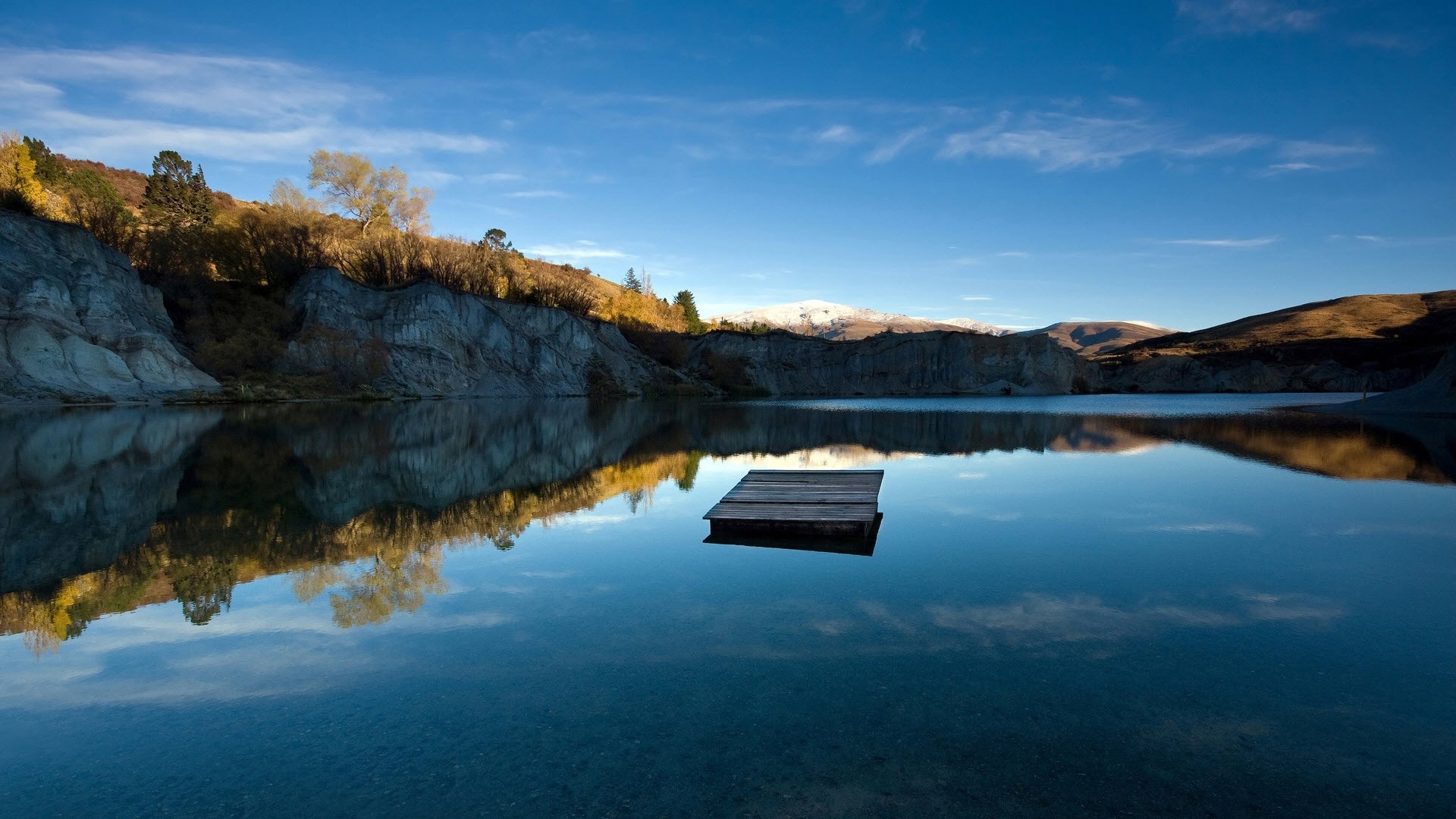 Lake with wooden platform and reflections HD Wallpaper