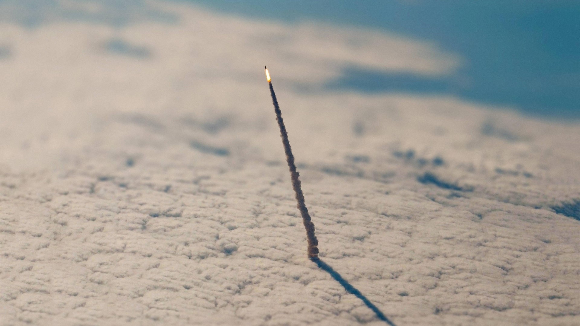 Rocket Launching Above Clouds HD Wallpaper
