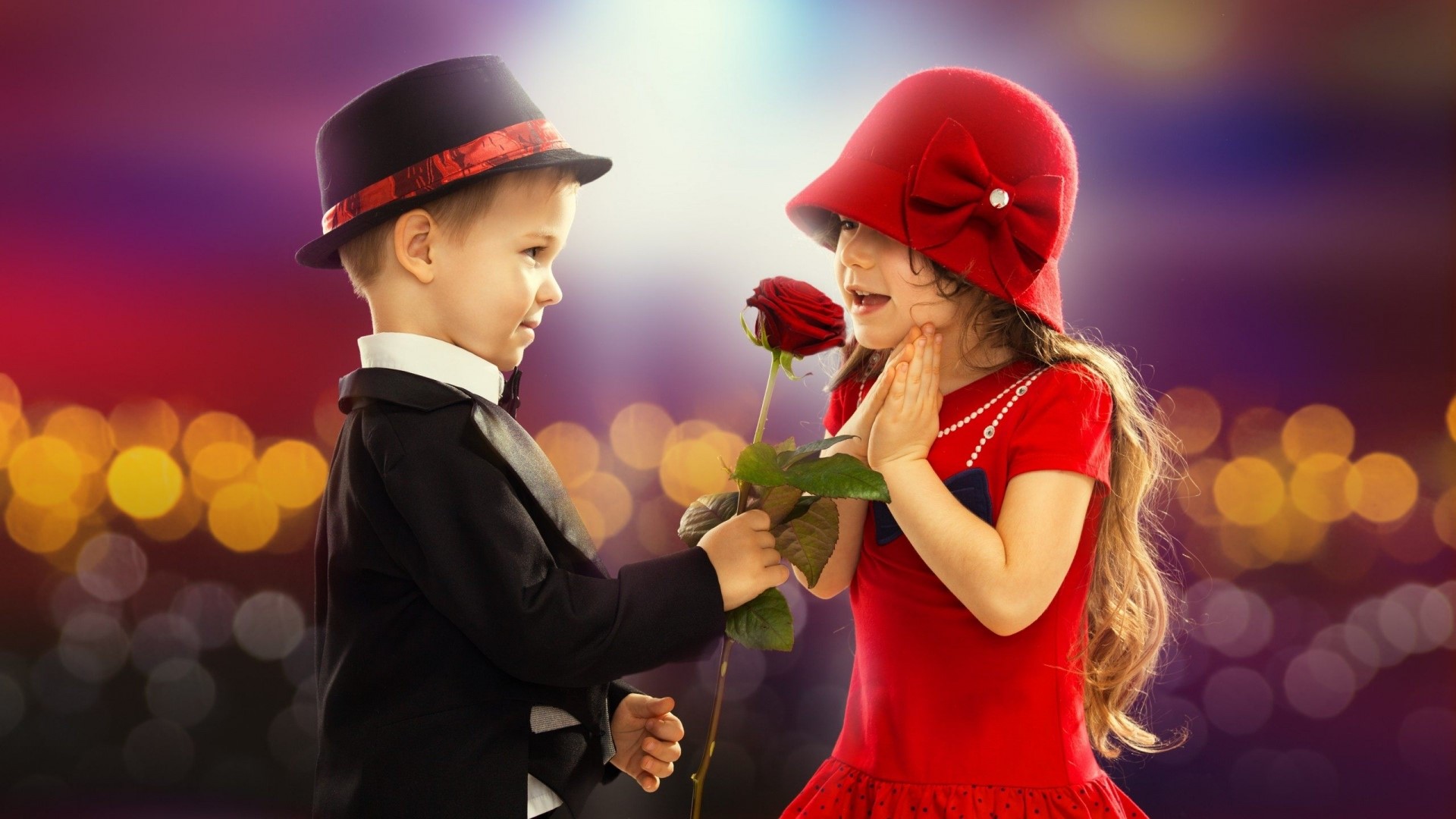 Boy in Tuxedo Gives Rose to Girl in Red Dress HD Wallpaper
