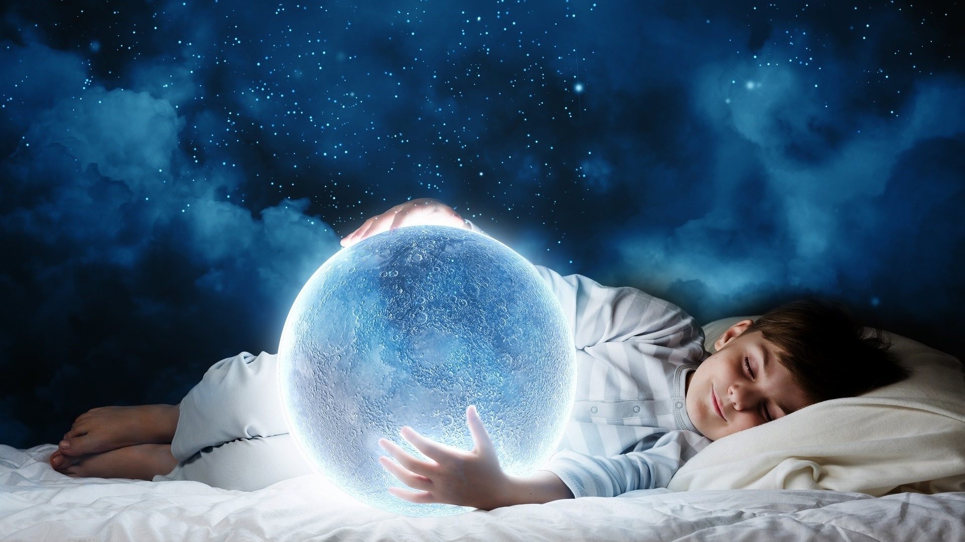 Boy sleeping and holding a glowing moon HD Wallpaper