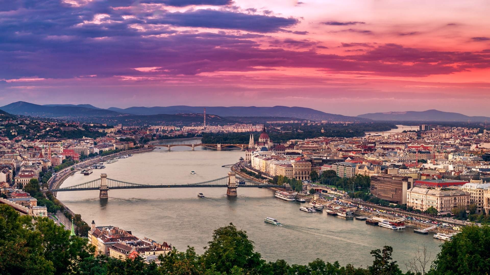 Budapest cityscape with Danube River and bridges at sunset HD Wallpaper
