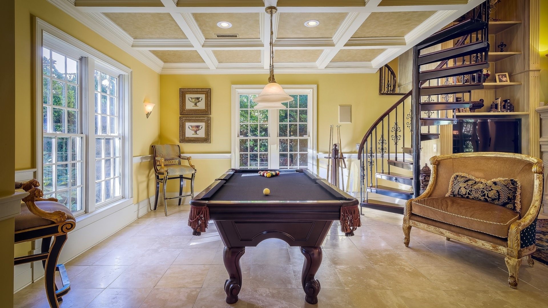 Play room interior with pool table and spiral staircase HD Wallpaper