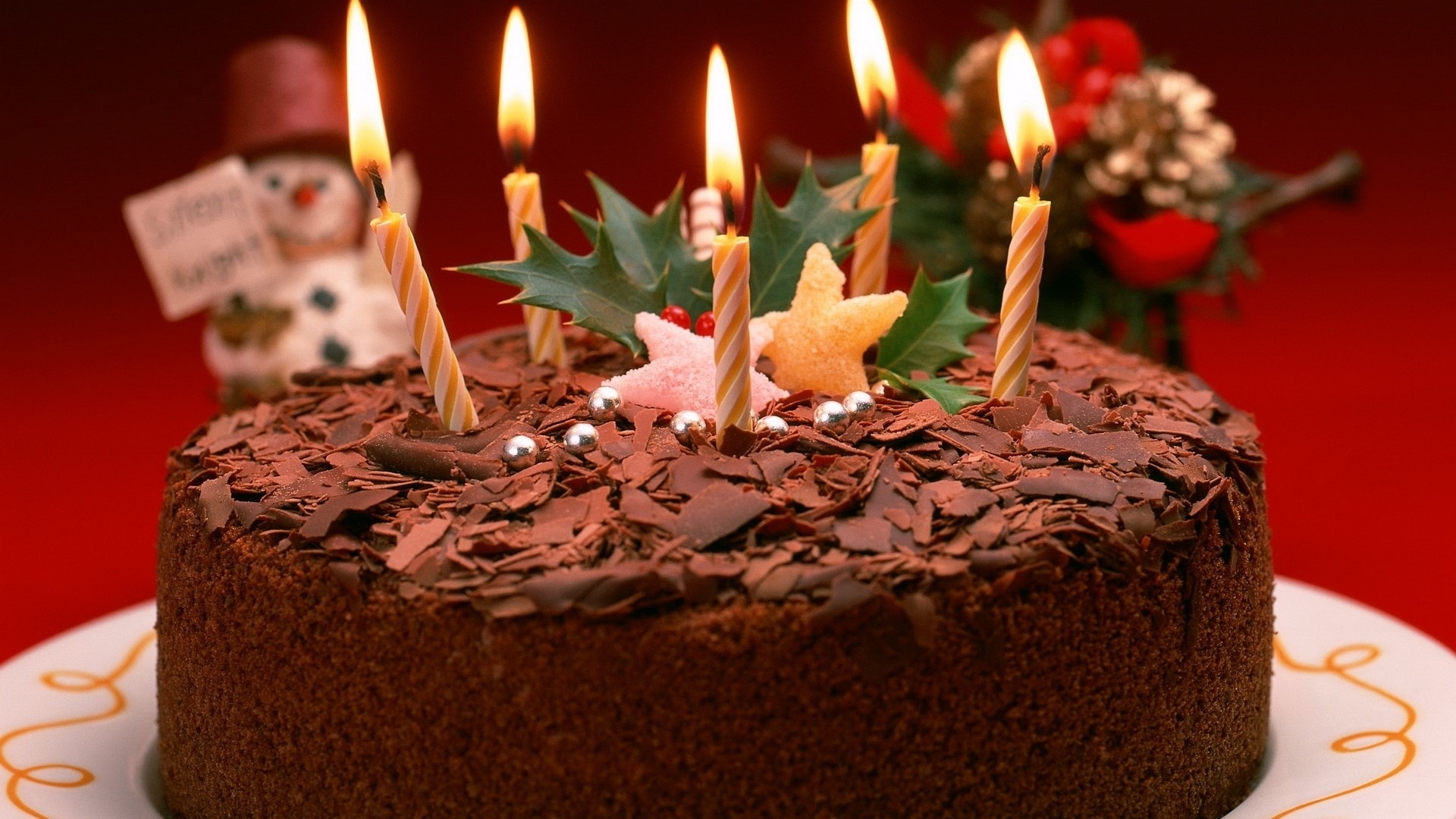 Chocolate birthday cake with candles and decorations HD Wallpaper
