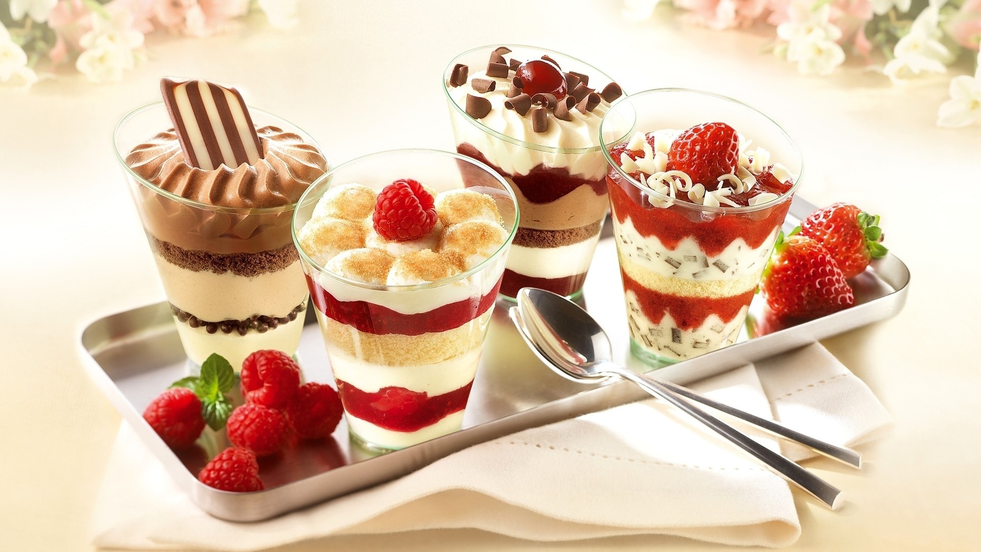 Four dessert parfaits with fruit and chocolate HD Wallpaper
