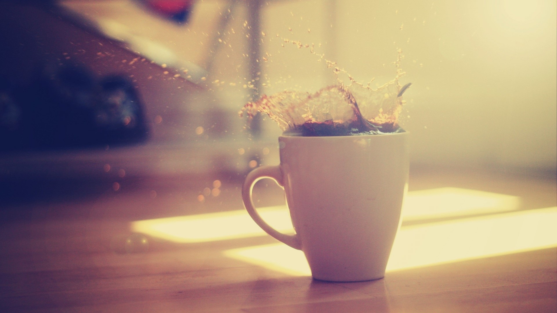 Coffee splashing out of a white mug HD Wallpaper