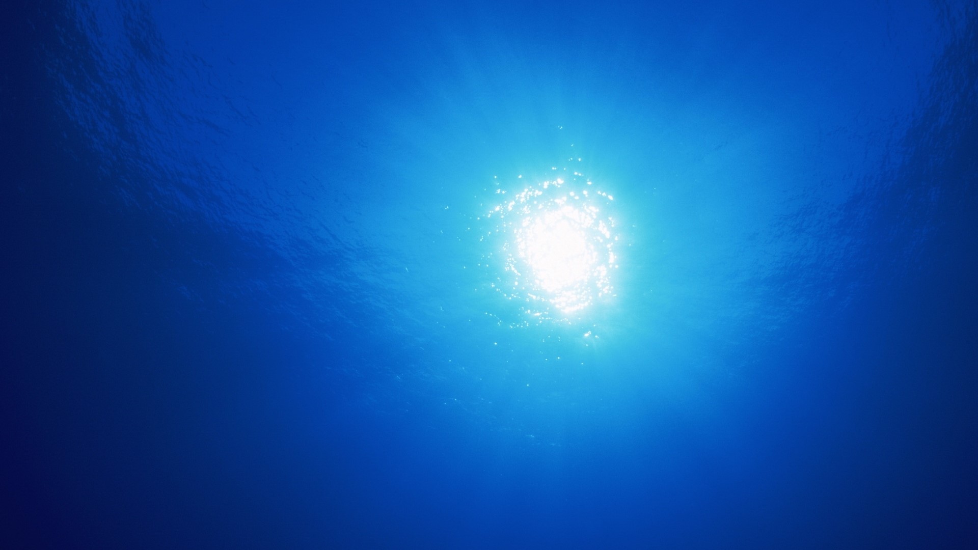 Sunlight seen through blue water HD Wallpaper