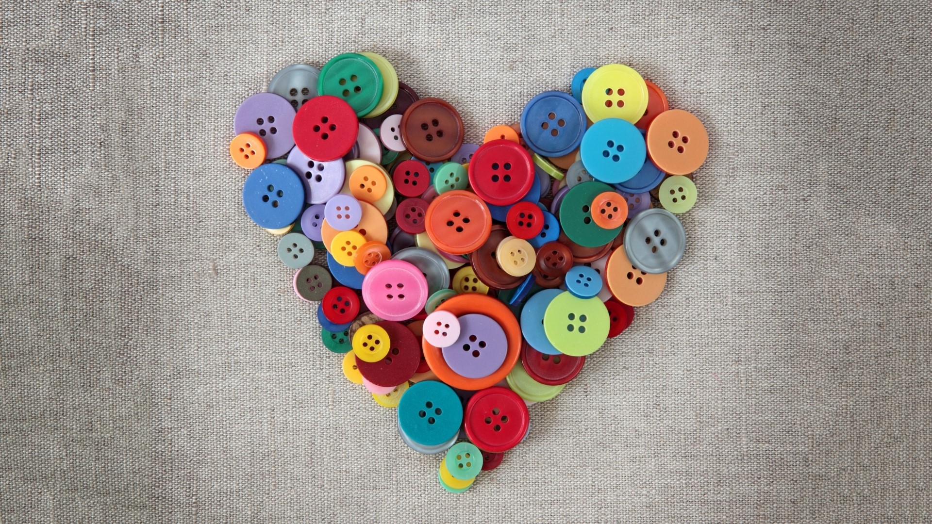 Heart shape made of colorful buttons HD Wallpaper