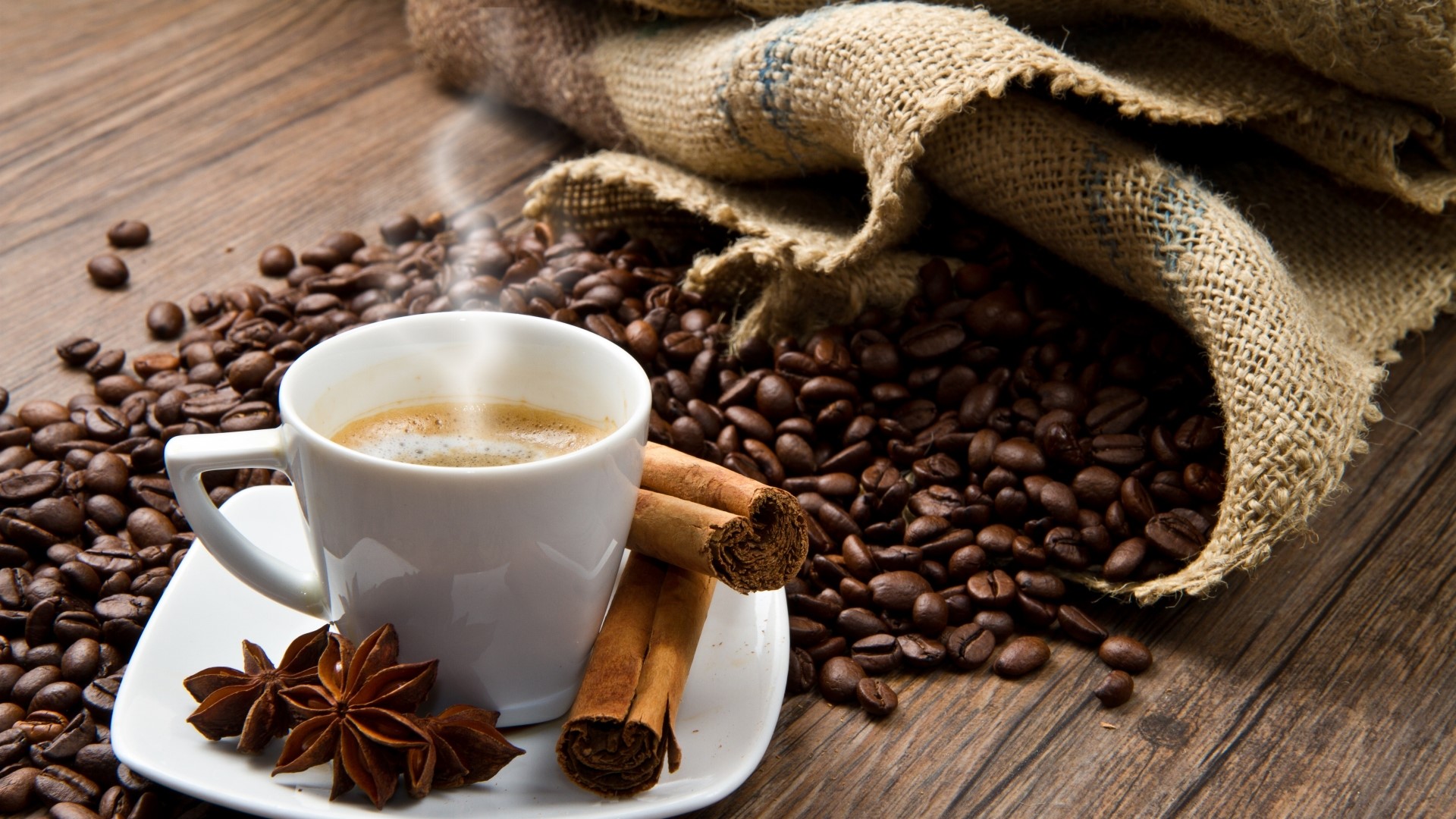 Coffee cup with beans and spices HD Wallpaper
