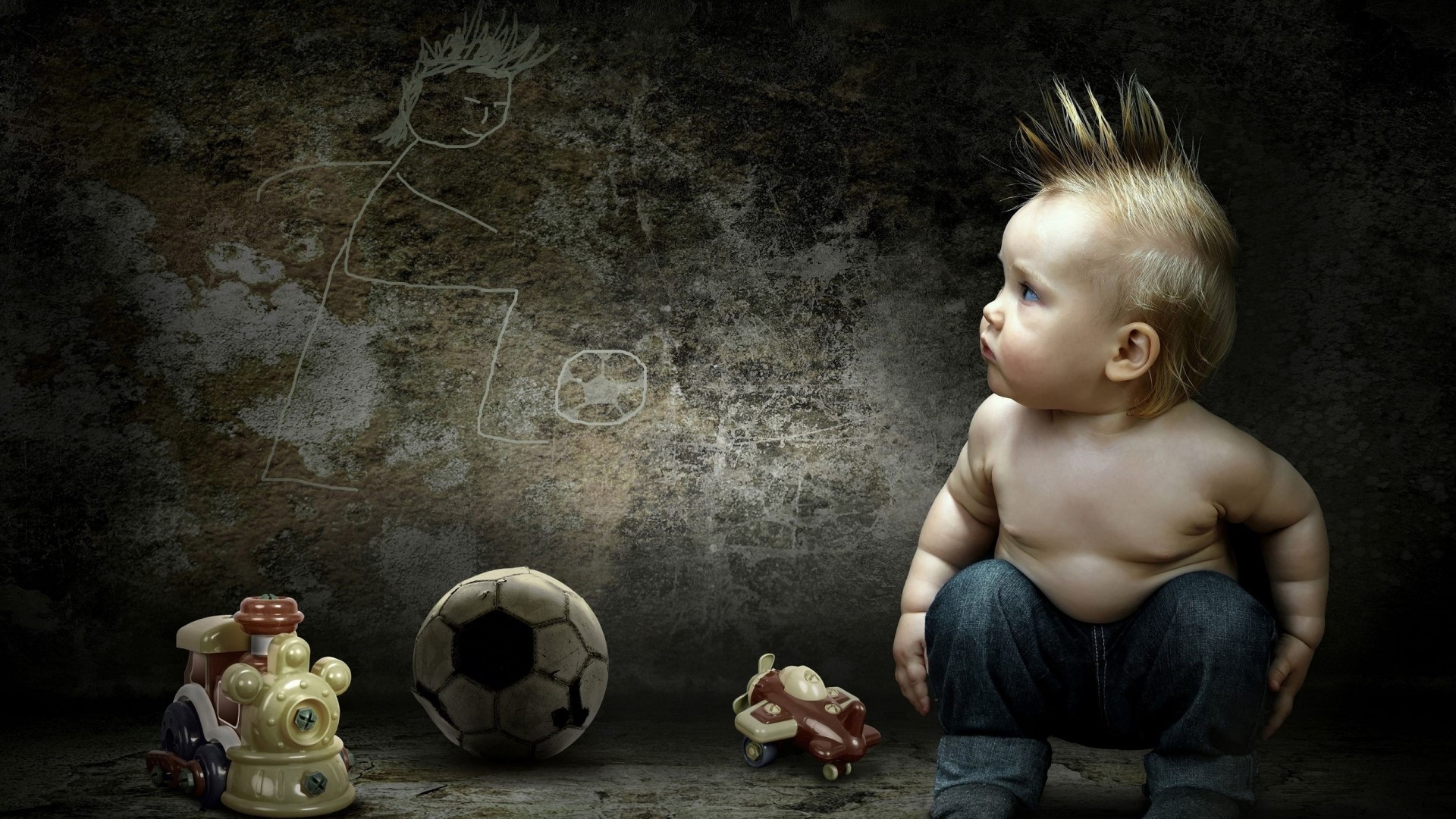Baby with Spiky Hair and Toys HD Wallpaper