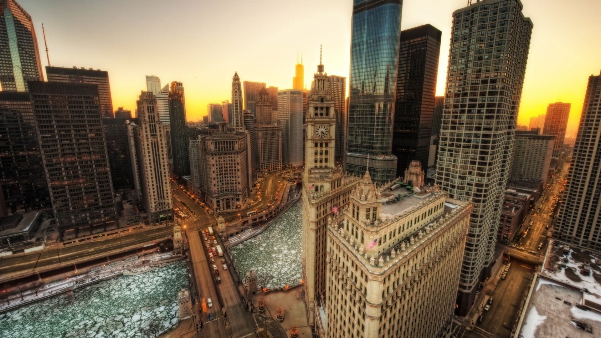 Chicago skyline at sunset with frozen river HD Wallpaper
