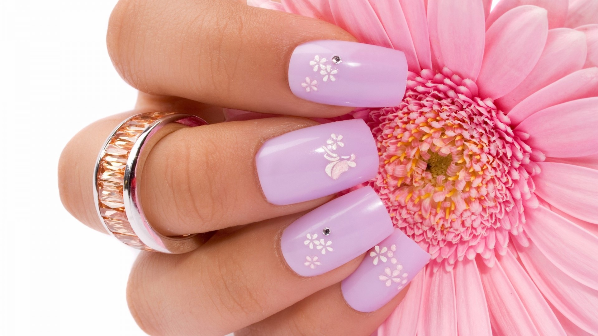 Woman's hand with purple nails and flower HD Wallpaper
