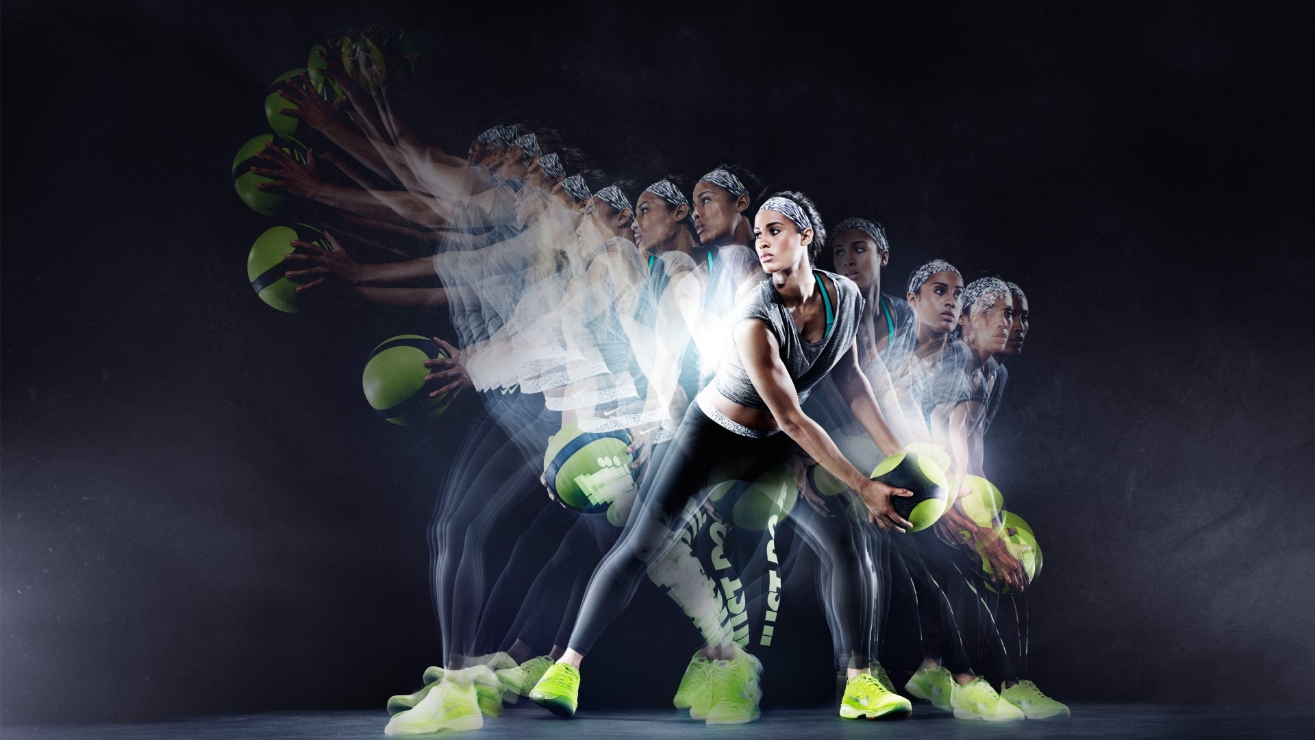 Woman performing fitness ball workout with motion blur HD Wallpaper
