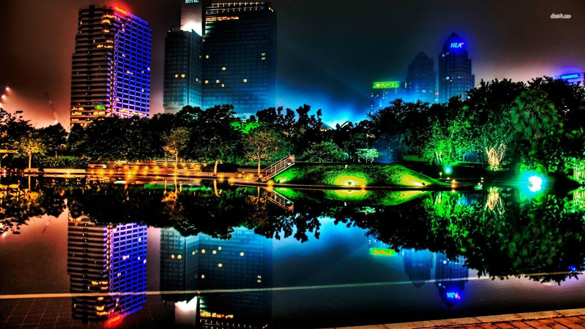 Colorful Cityscape at Night Reflected in Water HD Wallpaper
