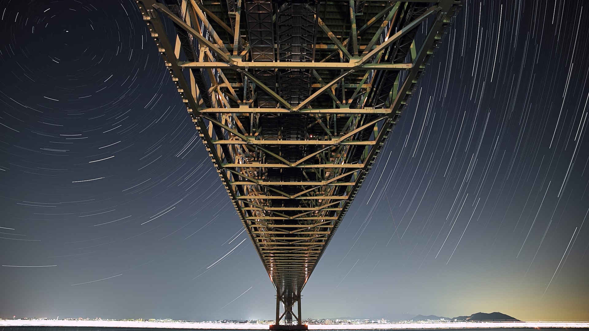 Star trails under the Akashi Kaikyo Bridge HD Wallpaper