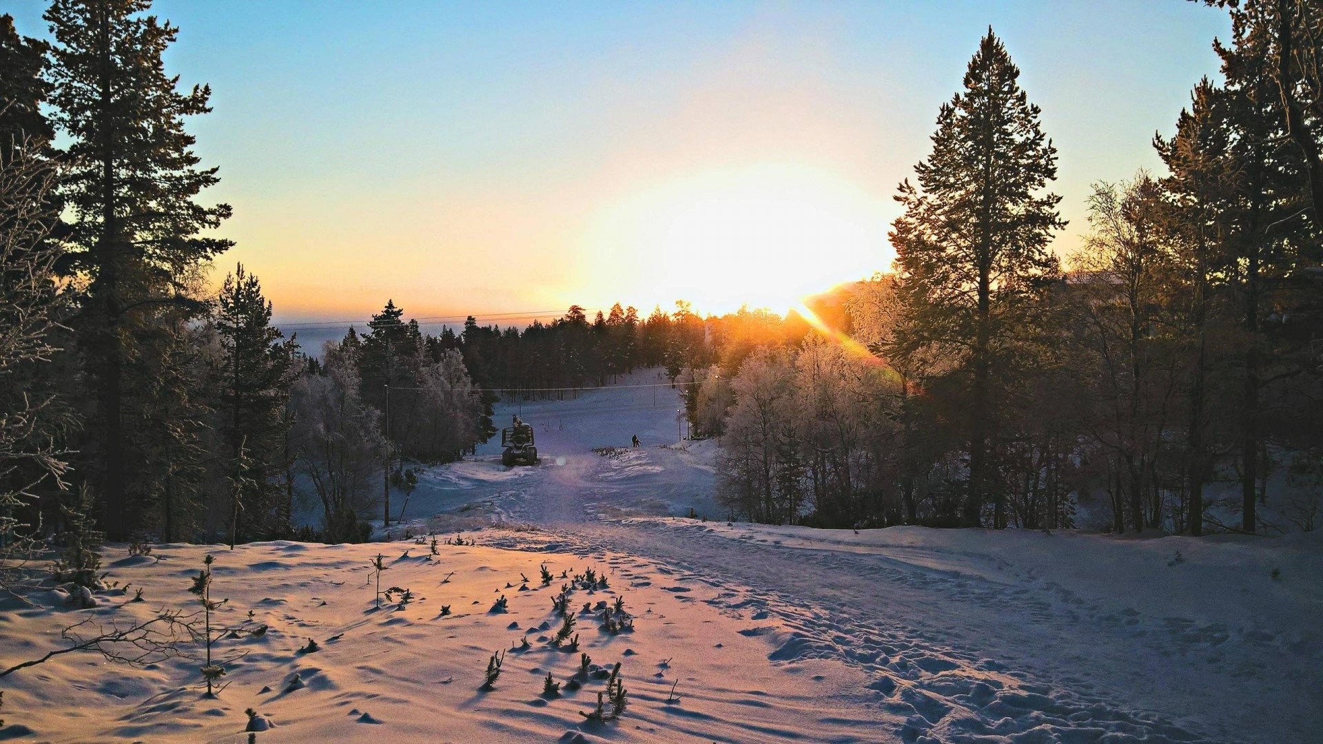 Sunset over snowy forest in Lappland, Finland HD Wallpaper