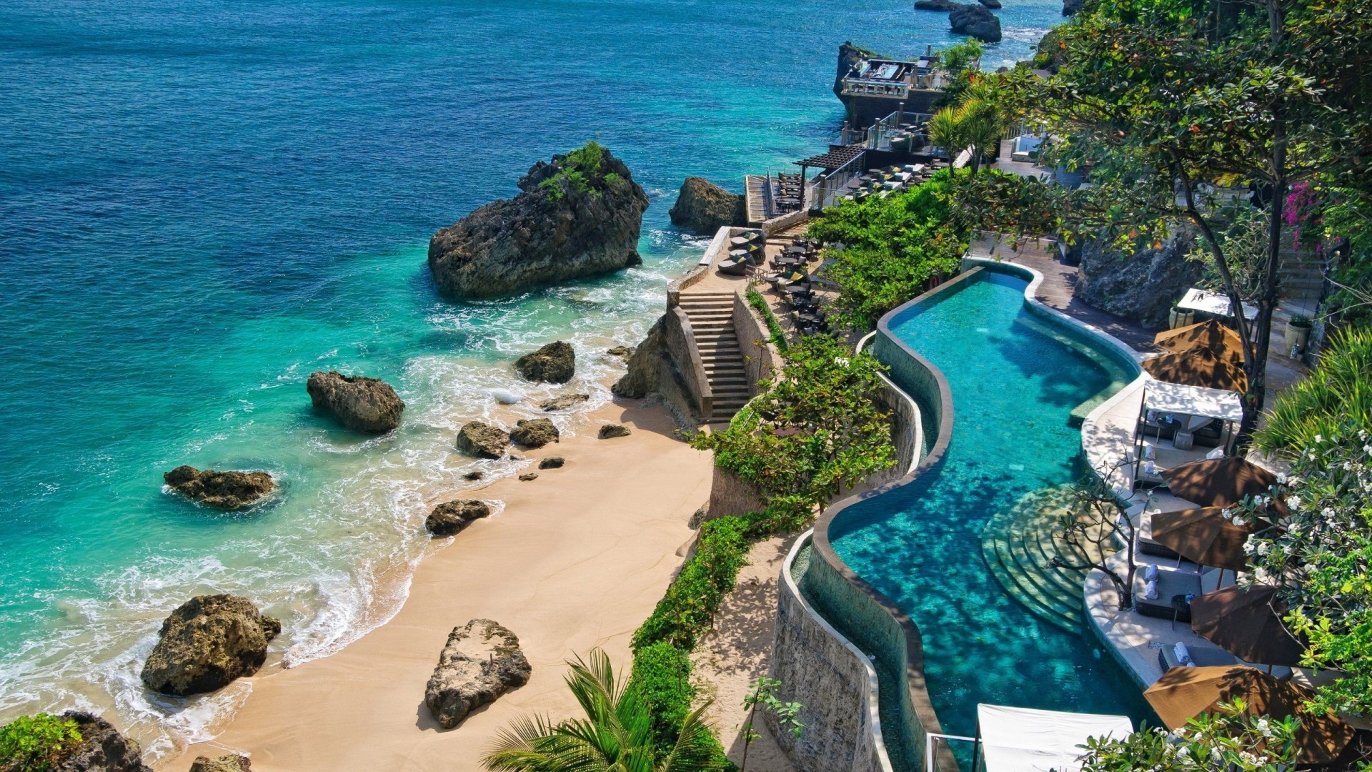 Beach with infinity pool and ocean view HD Wallpaper