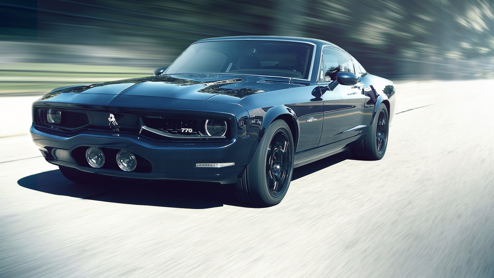Equus Bass 770 driving on a road HD Wallpaper
