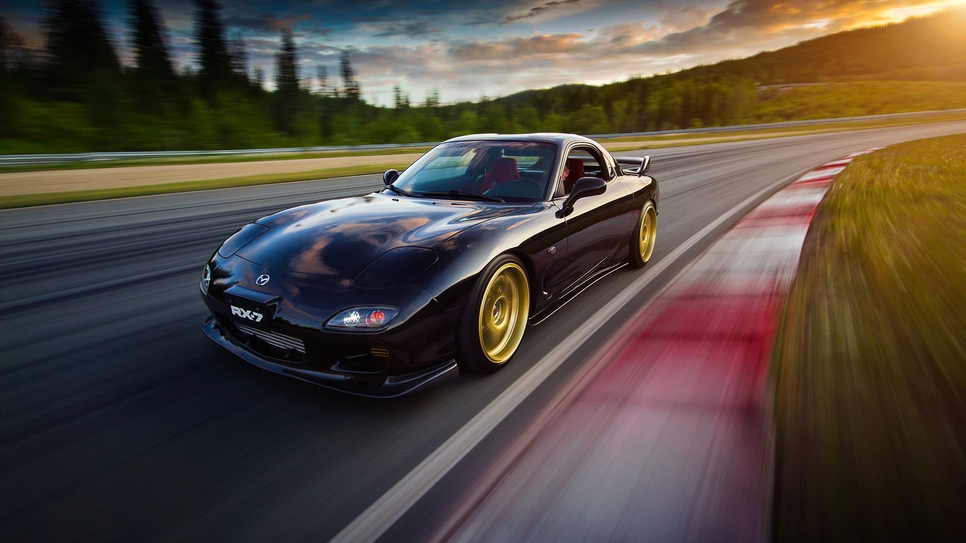 Black Mazda RX7 on a Racetrack HD Wallpaper